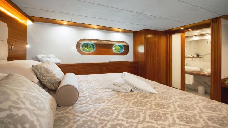 The comfort cabin offers a large bed, fitted wardrobes and a bathroom.